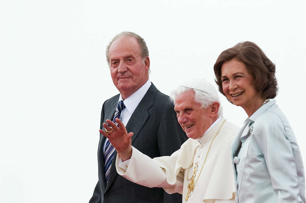 Pope Benedict XVI waves to the crowd surrounded by Queen Sofia and King Juan Carlos at the end of his visit to Spain for leading The World Youth Day 2011, at Barajas airport on August 21, 2011 in Madrid, Spain. Initiated by Pope John Paul II in 1985, World Youth Day youth-oriented events for the celebration of the Catholic faith are held every three years in a different country; this time in Madrid from August 16th to 21st, 2011. 