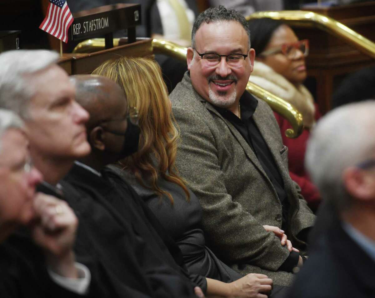 U.S. Secretary of Education and Meriden native Miguel Cardona attends the governor's State of the State address to the opening legislative session at the Capitol in Hartford Jan. 4, 2023.