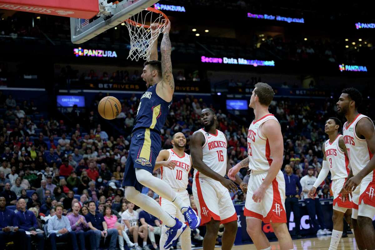 New Orleans Pelicans center Willy Hernangomez dunks against the Houston Rockets during the first half of an NBA basketball game in New Orleans, Wednesday, Jan. 4, 2023. (AP Photo/Matthew Hinton)