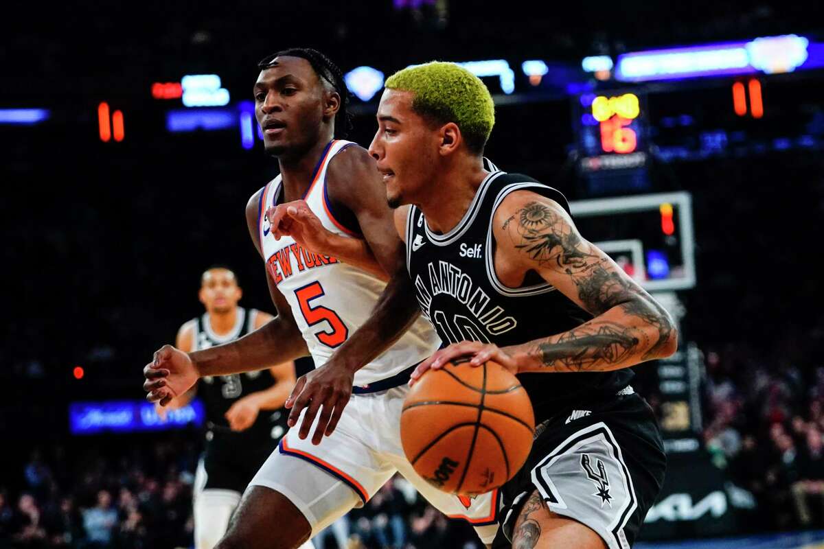 The Spurs' Jeremy Sochan drives past the Knicks' Immanuel Quickley during the first half of Wednesday night’s game. Sochan was held scoreless in the game and went 0 for 3 from the field.