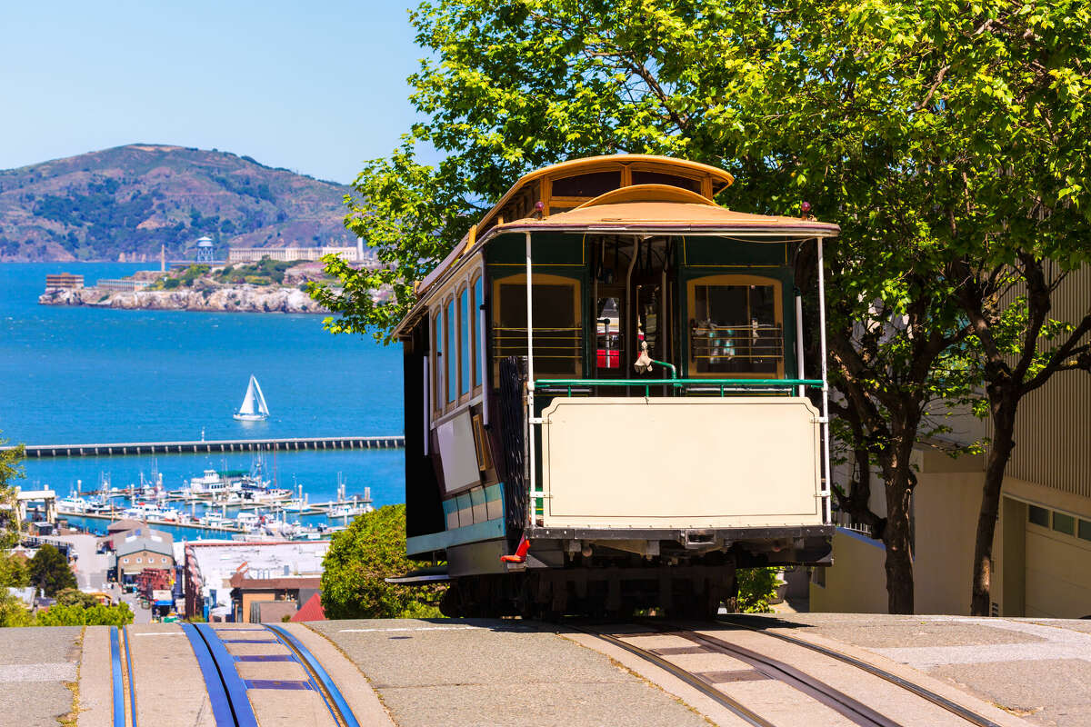 A cable car climbs Hyde Street in Russian Hill.