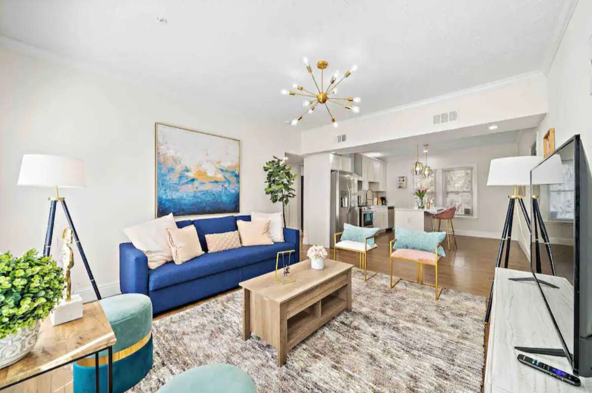 This glamorous listing is located in a beautiful building in Houston's Museum District.