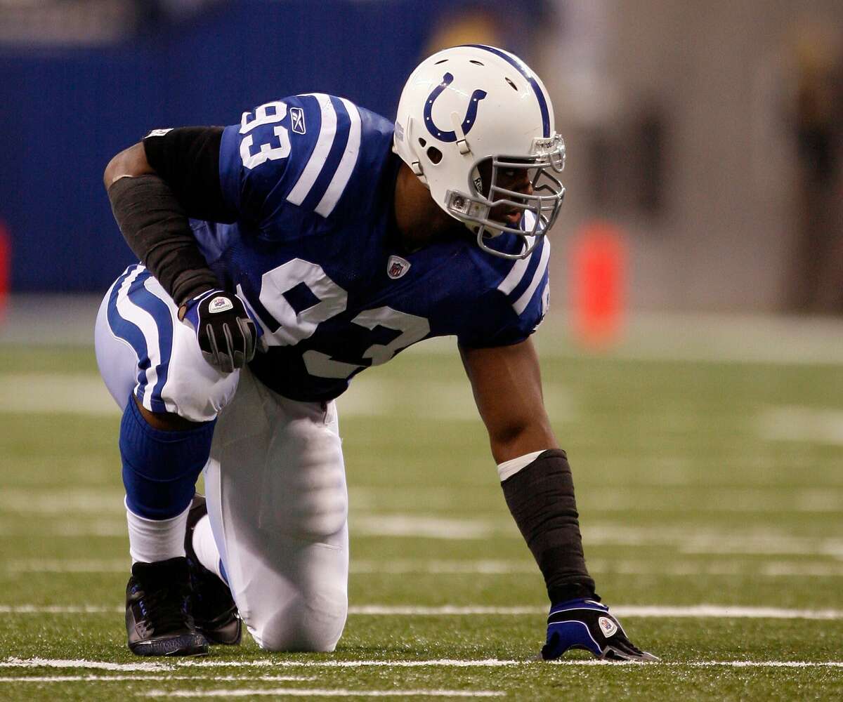 INDIANAPOLIS - NOVEMBER 16: Dwight Freeney #93 of the Indianapolis Colts gets set against the Houston Texans during the game at Lucas Oil Stadium on November 17, 2008 in Indianapolis, Indiana. (Photo by Harry How/Getty Images)