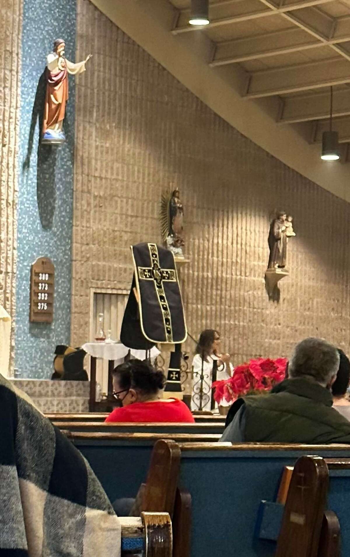 Images from inside St. Frances Cabrini Catholic Church on Jan. 4, 2023 as mass was celebrated in honor of the late Pope Bendict XVI.