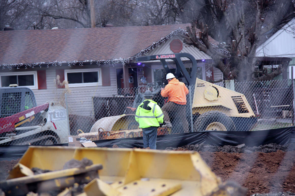 Construction workers also have been using a steamroller on the Third Street side of the project. 