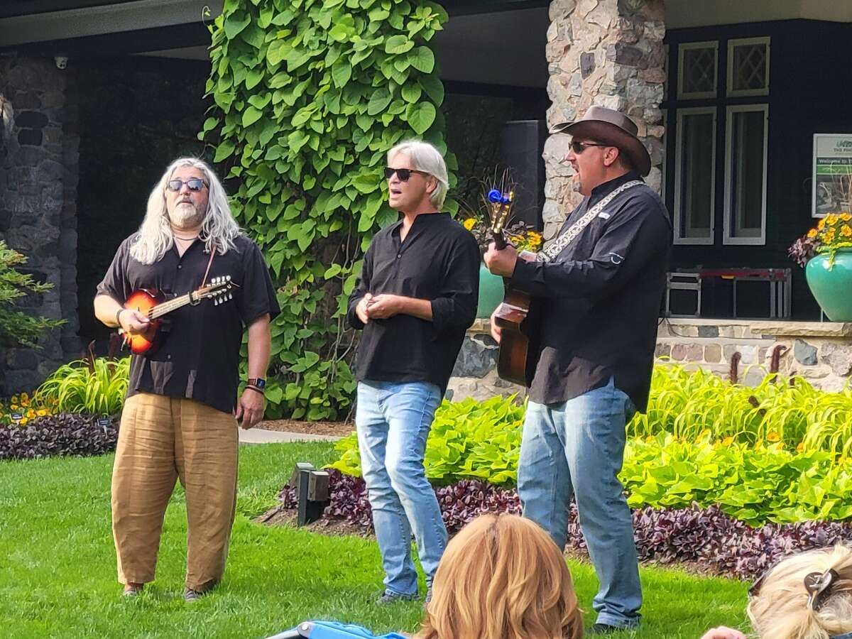 As part of the Pines Concert Series at Dow Gardens in July, brothers Michael and Scott Robertson played with Joe Balbaugh on bass, Donny Brown on drums, Rosco Selley on harmonica and Mike Thomas on keys.