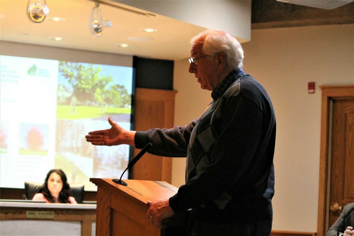 John Helge, Manistee Tree Commission chair, gives a presentation Tuesday during a Manistee City Council meeting.