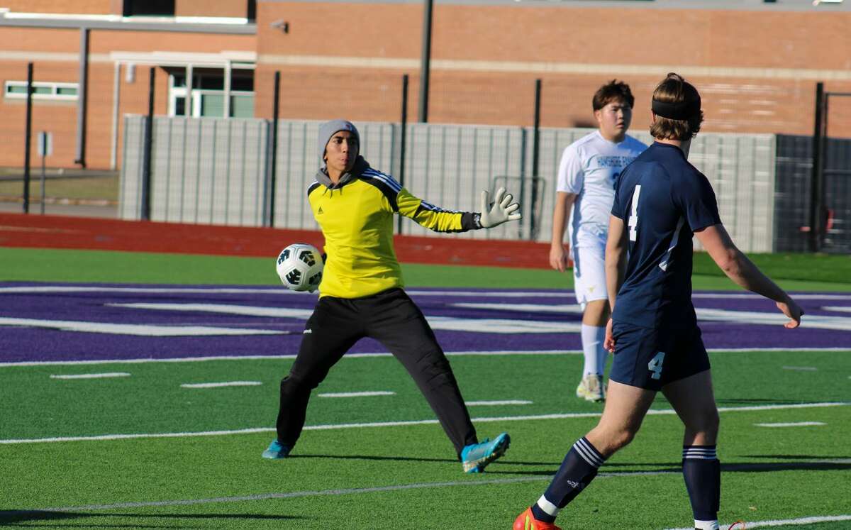 Hamshire-Fannett's goalie throws the ball out to a teammate during the Port Neches-Groves Kickoff Classic on Thursday.