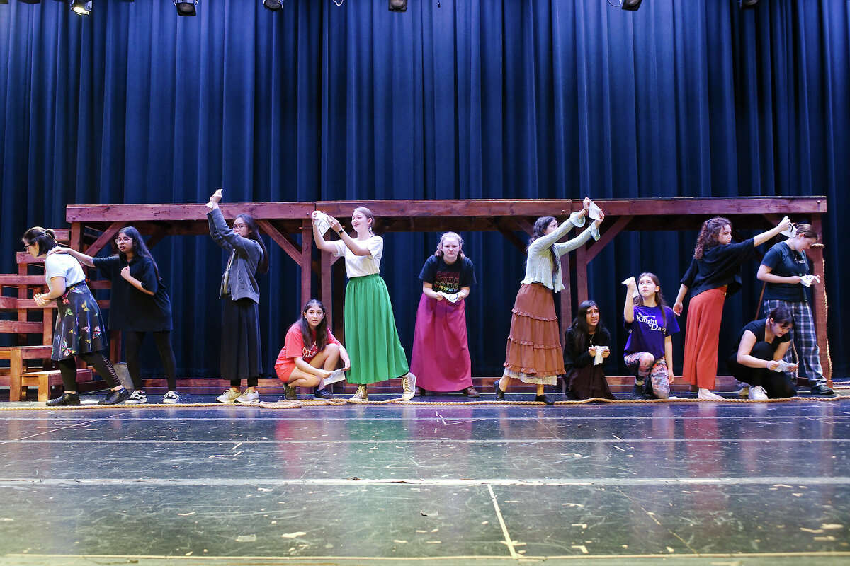 Cast members rehearse a scene from Ladyship A New Musical at Clear Brook High School.