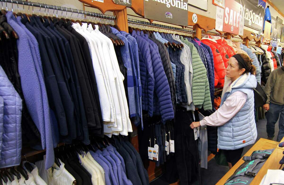 Customer Beth McGrath shops at Threads and Treads in Greenwich, Conn., on Thursday January 5, 2023. The shop, which has been here since the 1970's, is keeping up with current fitness trends.