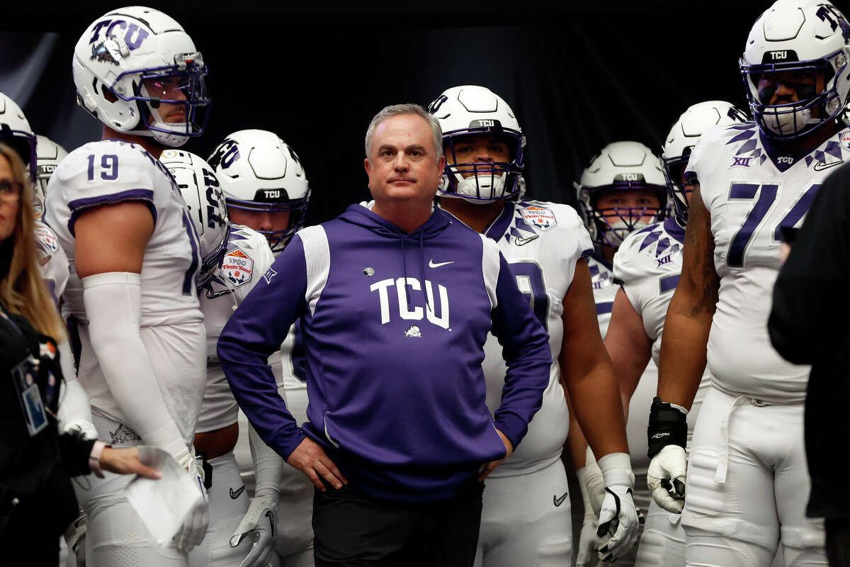 Head coach Sonny Dykes of the TCU Horned Frogs waits to take the field before the Vrbo Fiesta Bowl against the Michigan Wolverines at State Farm Stadium on December 31, 2022 in Glendale, Arizona. The Horned Frogs defeated the Wolverines 51-45. 