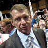 FILE - Vince McMahon stands at Republican state convention in Hartford, Conn., Friday, May 18, 2012. McMahon is rejoining the board of WWE several months after he stepped down as CEO and chairman of the sports entertainment company during an an investigation into alleged misconduct. Shares surged more than 22% in midday trading on Friday, Jan. 6, 2023.