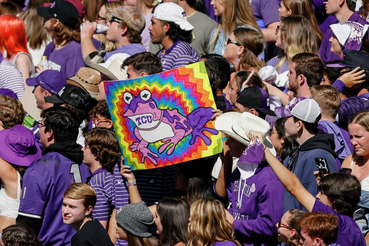 TCU Horned Frogs fans hold up a Hypnotoad sign during the game during the game between the TCU Horned Frogs and the Texas Tech Red Raiders on November 5, 2022 at Amon G. Carter Stadium in Fort Worth.