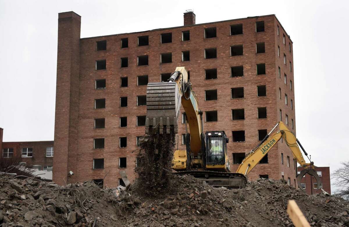 The vacant John P. Taylor Apartments towers owned by the Troy Housing Authority are being demolished to make way for new public housing on Friday, Jan. 6, 2023, on River at Congress St. in Troy, N.Y. Taylor 1 and 2, which were built in the 1950s, have been vacant since 2006. Taylor 3 and 4 are open and will be replaced. The residents in these two buildings will have the opportunity to move into the new Taylor residence.