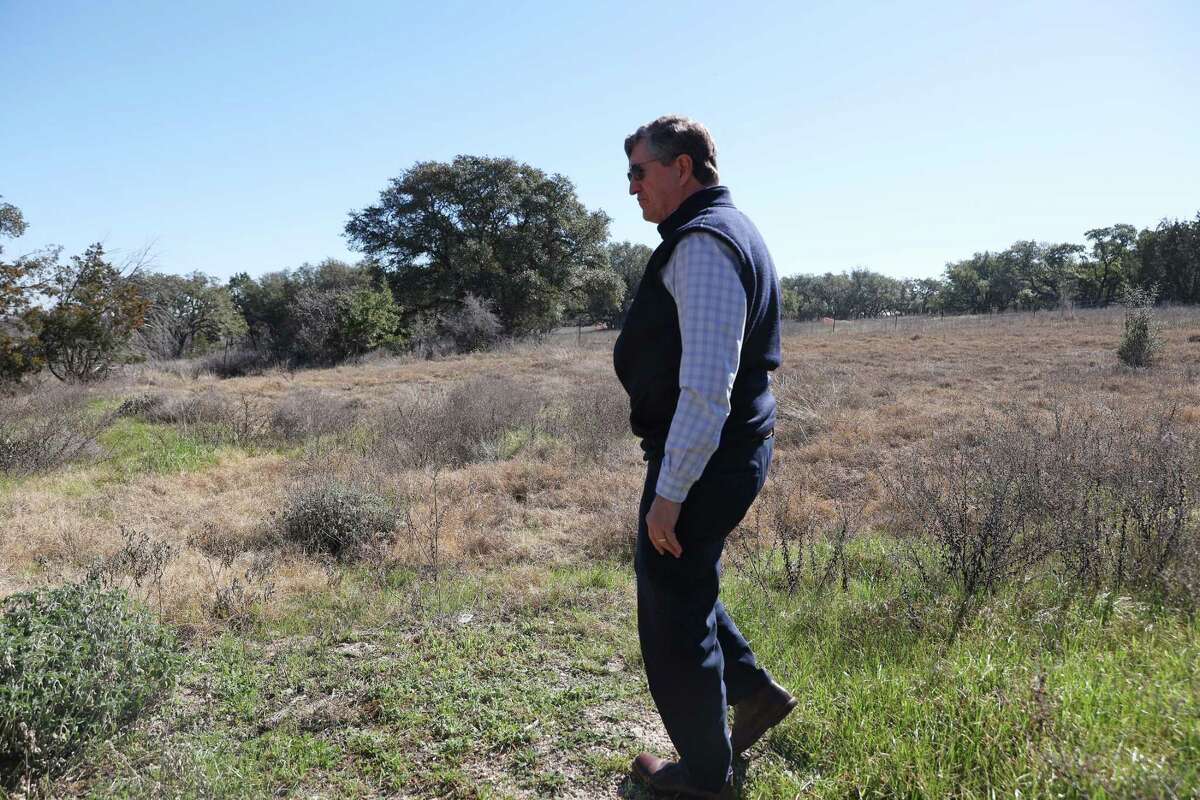 Bob Ayres, owner of the Shield Ranch, walks near the site of a planned 32-acre concert venue near Dripping Springs, Thursday, Jan. 5, 2023. Ayers and other ranch and homeowners in the area have banded together as Stop Fitzhugh Concert Venue to fight against the 5,000-seat concert venue on Fitzhugh Road north of Dripping Springs, Texas.