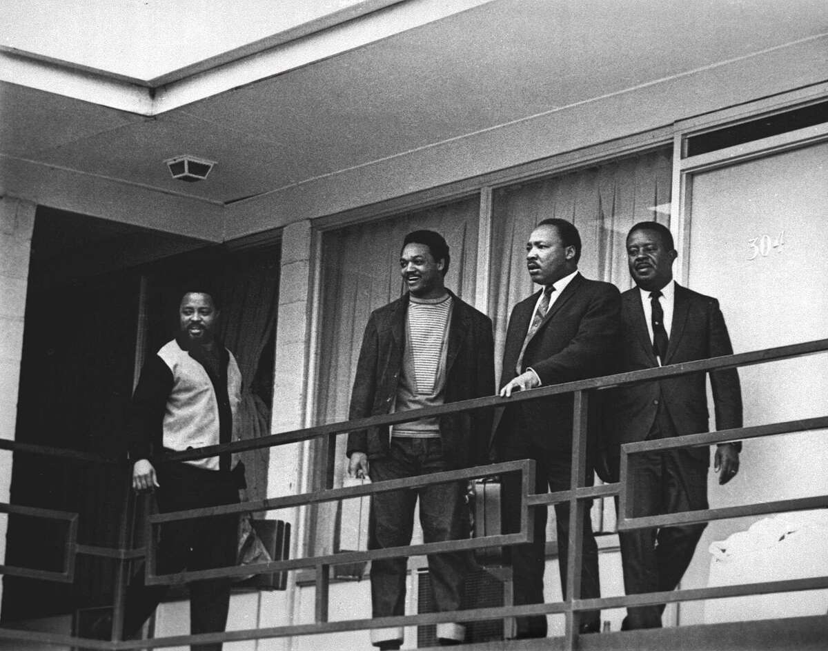 Martin Luther King Jr., second from right, stands on the balcony of the Lorraine Motel in Memphis, Tenn., on April 3, 1968, the day before he was assassinated there. From left are, Hosea Williams, Jesse Jackson, King, and Ralph Abernathy.