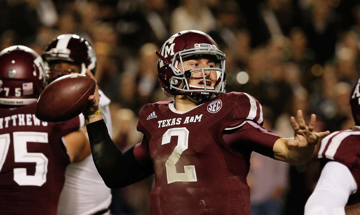 Johnny Manziel of the Texas A&M Aggies drops back to pass in the second half during the game against the Mississippi State Bulldogs at Kyle Field on November 9, 2013 in College Station, Texas.