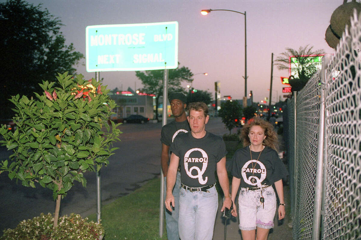 From the July 4, 1992, Houston Chronicle: Q-Patrol members Christopher Miles, from left, Keith Stewart and Jan Lee patrol the Westheimer area at Melrose Thursday night in an effort to reduce crime. The citizens' group was formed in the wake of Paul Broussard's death at the hands of 10 men who beat him because he was gay. Today, the first anniversary of Broussard's death, gay community leaders say the Montrose area is a safer place.