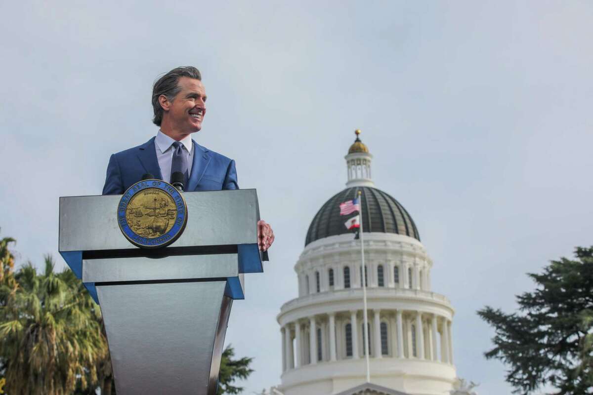 California Gov. Gavin Newsom smiles after taking the oath of office on Jan. 6, 2023, outside the California Capitol in Sacramento.