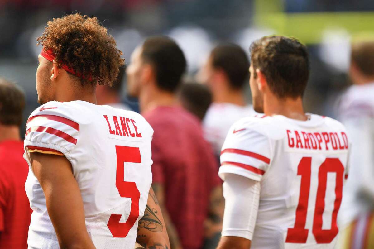 INGLEWOOD, CA - AUGUST 22: San Francisco 49ers quarterback Trey Lance (5) stands next to San Francisco 49ers quarterback Jimmy Garoppolo (10) during the NFL preseason game between the San Francisco 49ers and the Los Angeles Chargers on August 22, 2021, at SoFi Stadium in Inglewood, CA. (Photo by Brian Rothmuller/Icon Sportswire via Getty Images)