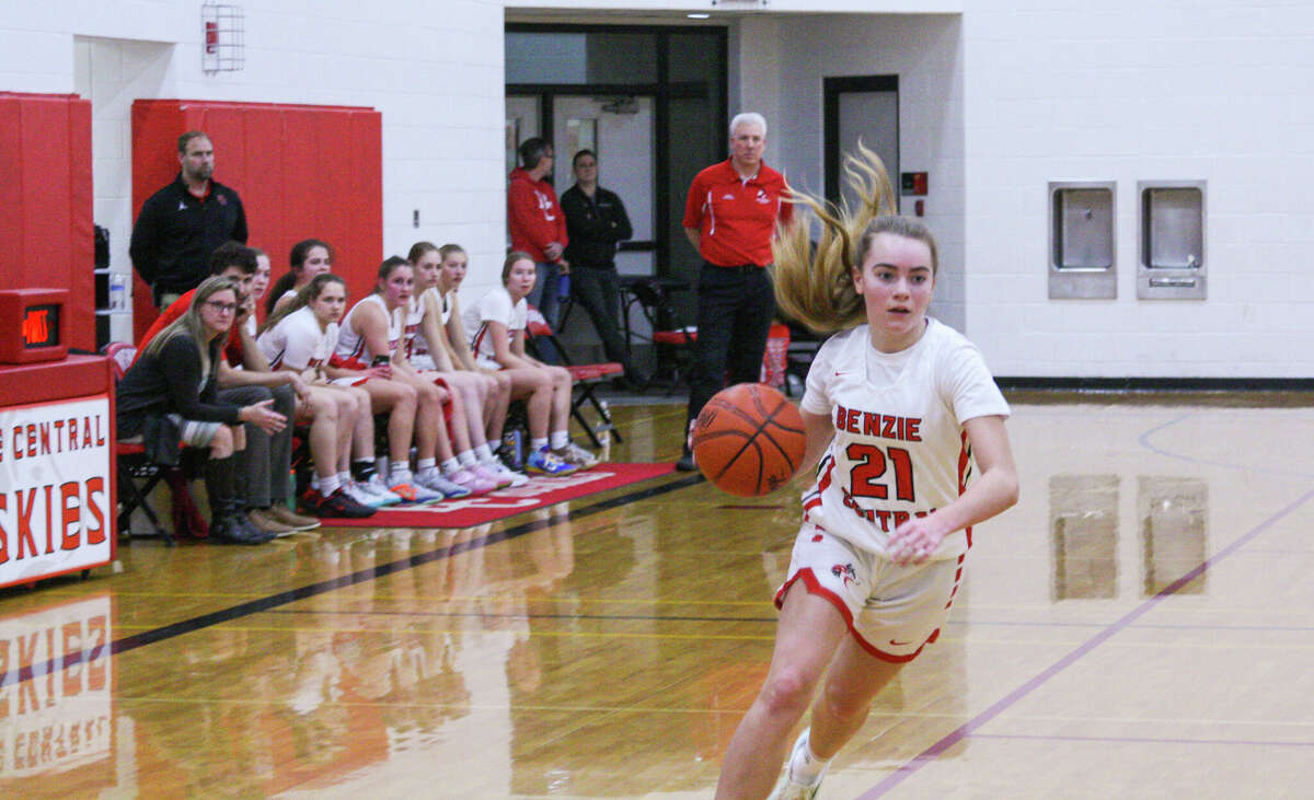 Benzie Central junior Kara Johnson pushes the ball up the floor against Suttons Bay on Jan. 6 at Benzie Central Middle School. 