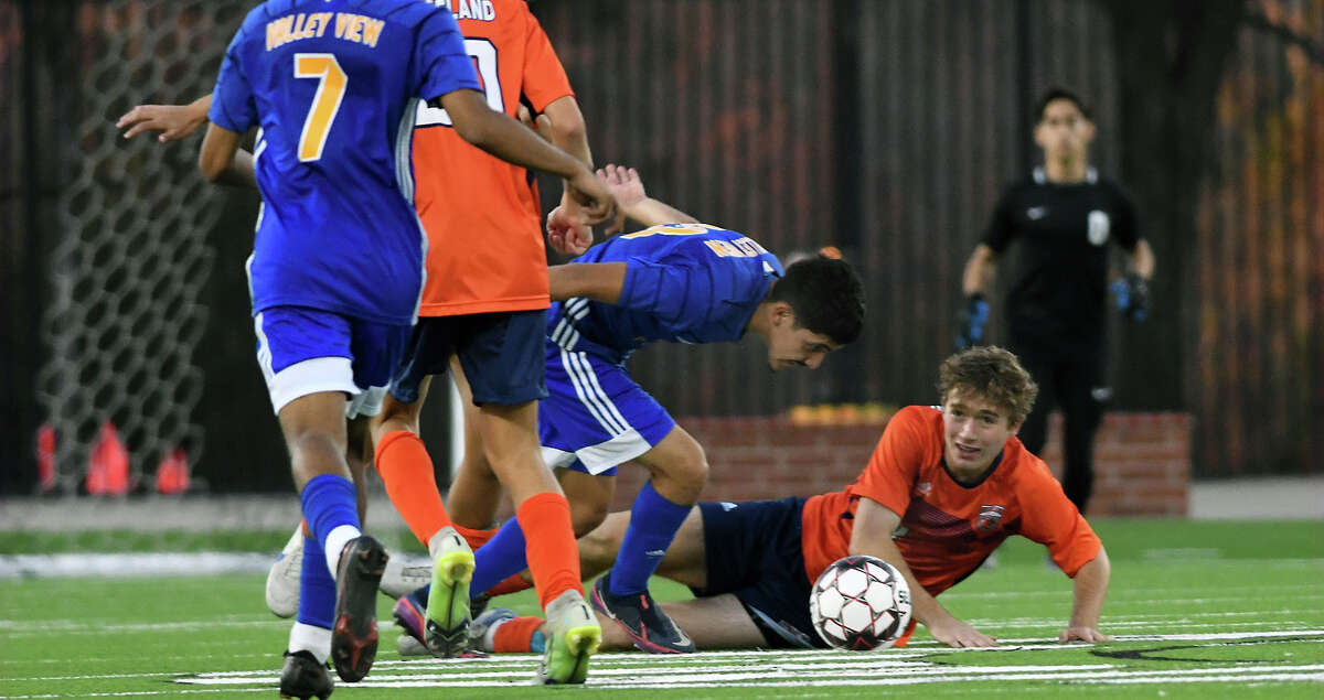 Bridgeland's James Strnad, right, battles for a loose ball against a Valley View defender during the second half of their matchup in the 2023 CFISD Soccer Showcase at CFFCU Stadium in Cypress on Friday, Jan. 6, 2023.