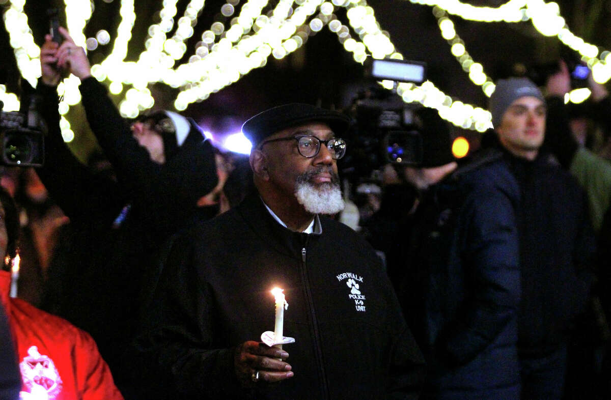 Carleton Giles, Pastor Emeritus at Zion Baptist Church, attends a candlelight vigil held in honor of state Rep. Quentin "Q" Williams on Union Green in downtown Middletown, Conn., on Friday January 6, 2023. Williams died Thursday morning in a wrong way crash on Route 9 just after attending the 2023 Inaugural Ball for Gov. Ned Lamont in Hartford. Hundreds of people from the Middletown community, along with officials from around the state were in attendance.