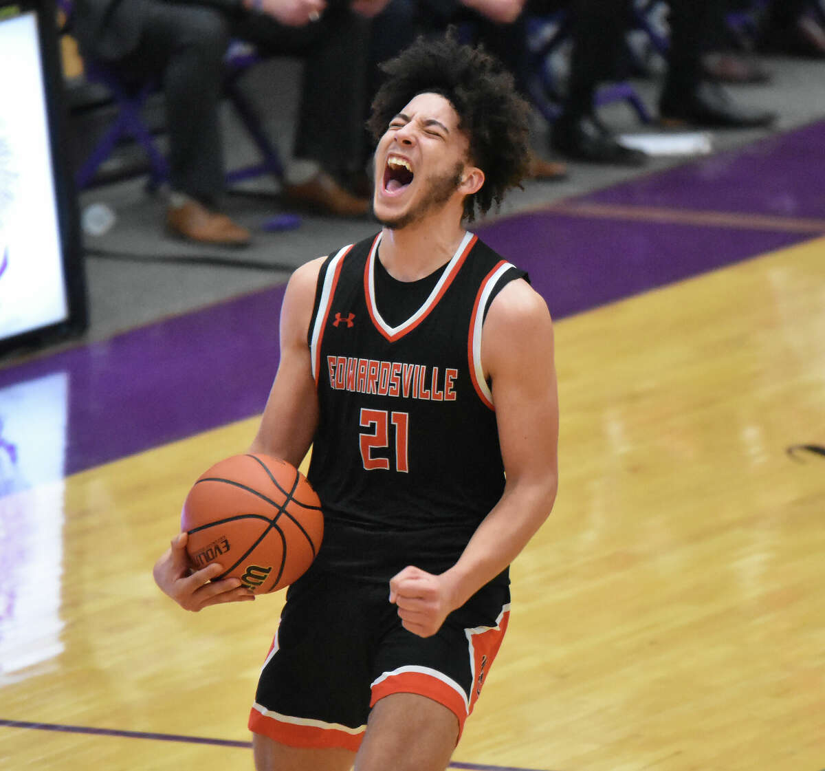 Edwardsville's Isayah Kloster celebrates the win over Collinsville on Friday in Southwestern Conference action inside Vergil Fletcher Gymnasium.