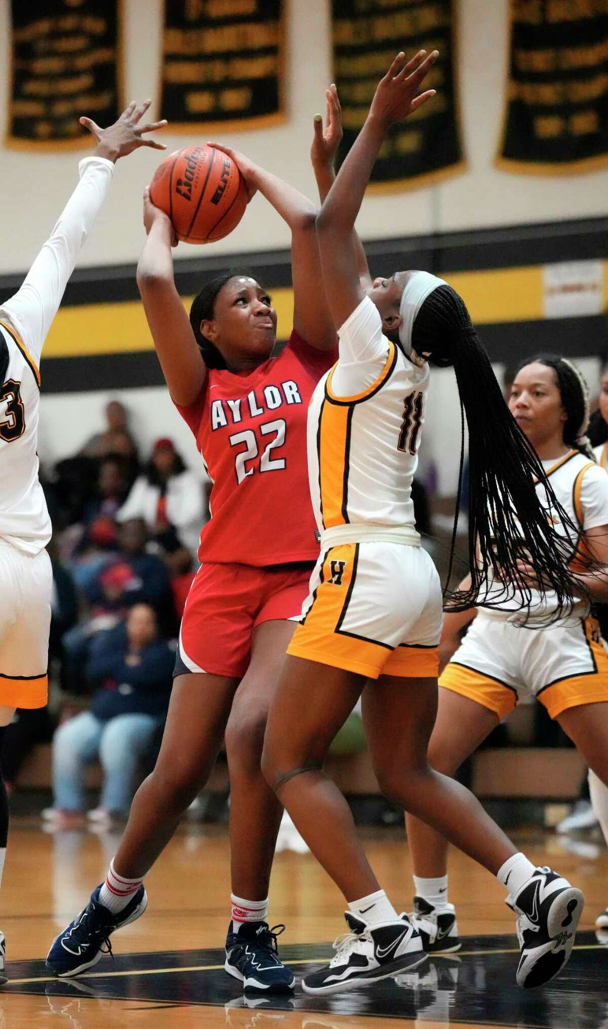 Alief Taylor's Nataliyah Gray (22) scored 24 points in her team's 45-41 bi-district playoff loss to Clear Brook on Tuesday night.