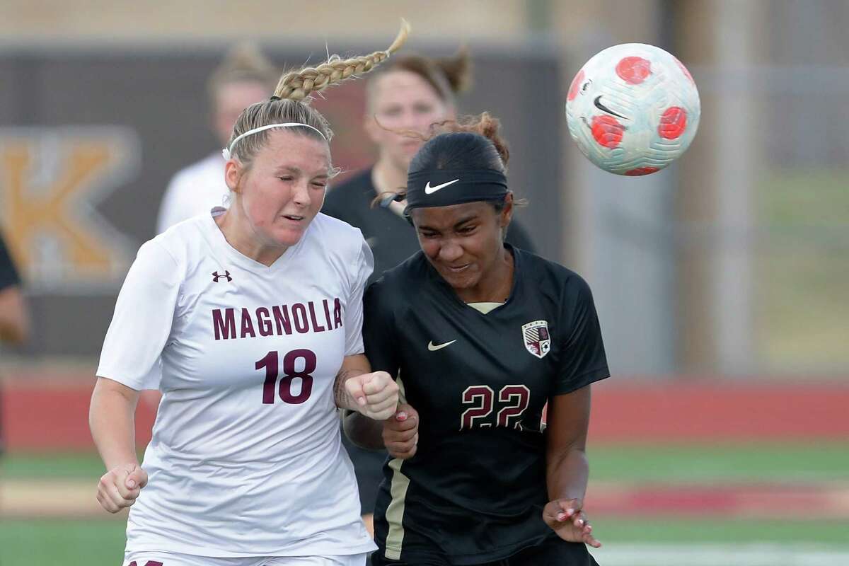 Magnolia's Rylee Pierce (18) and Summer Creek's Sohana Spencer (22) both go for a header during their game held at Summer Creek High School Saturday, Jan. 7, 2023 in Houston, TX.