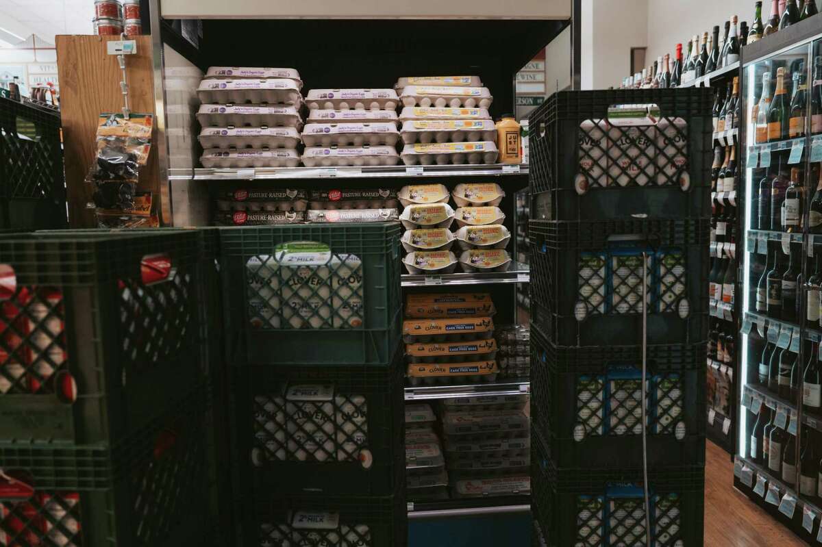 Eggs and milk shelves were fully stocked at the Good Life grocery store on Cortland Avenue in San Francisco on Saturday. Shift supervisor Jocelyn Navarrete said she was glad to be able to keep the store stocked because bigger grocery store chains were running out of eggs and dairy during the storm.