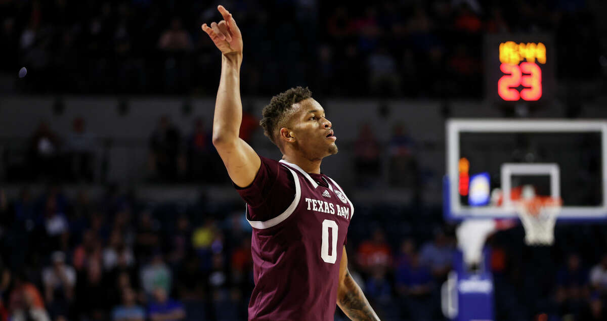 Dexter Dennis #0 of the Texas A&M Aggies celebrates during the first half of a game against the Florida Gators at the Stephen C. O'Connell Center on January 04, 2023 in Gainesville, Florida. (Photo by James Gilbert/Getty Images)
