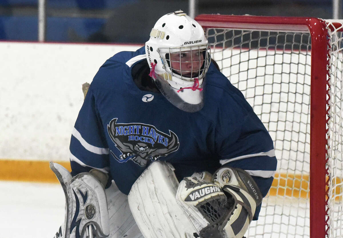 Avon goalie Sophia Ojala keeps her eyes on the action during a girls ice hockey game against West Haven/SHA at Bennett Rink on Saturday, Jan. 7, 2023.