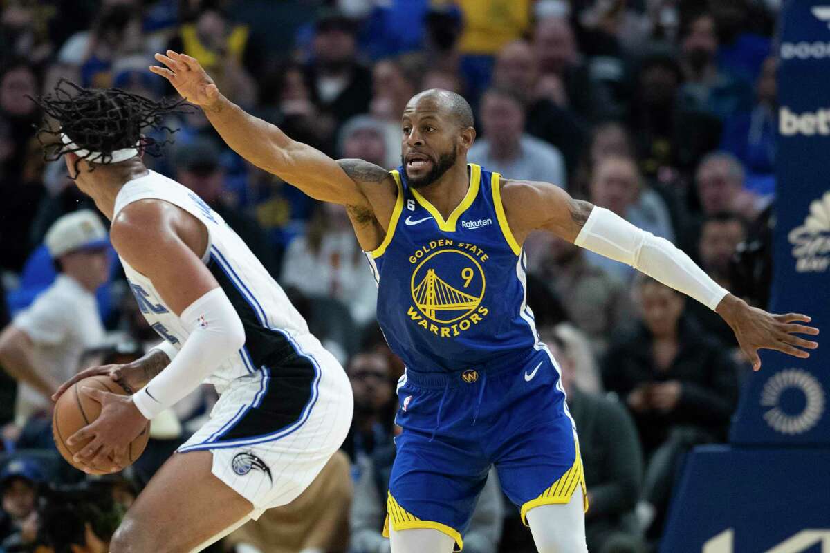 Golden State Warriors forward Andre Iguodala (9) defends during the first half of his NBA basketball game against Orlando Magic in San Francisco, Calif. Saturday, Jan. 7, 2023.