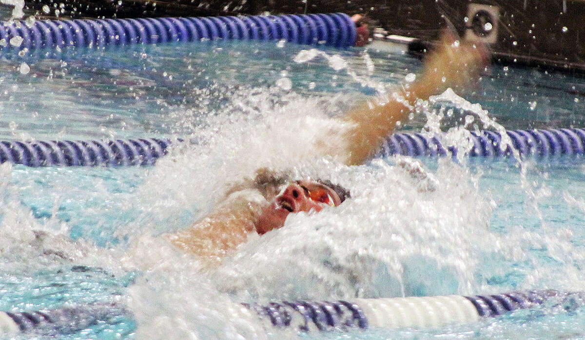 Edwardsville's Cohen Osborn finished sixth Satuerday in the 100-yard backstroke at the IHSA Boys State Swim Meet in westmont.