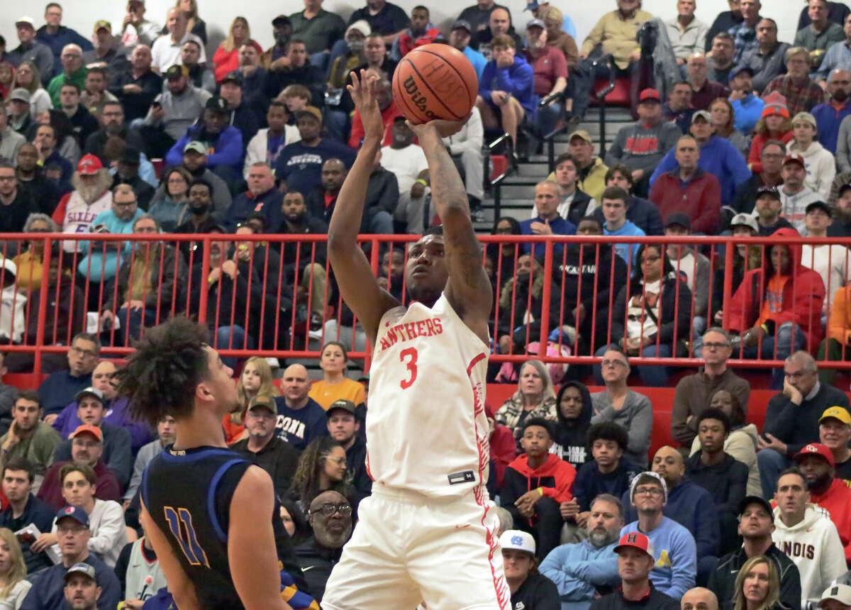 Imhotep (PA) wing Justin Edwards attempts a jump shot against Simeon on Saturday at the Highland Shootout. The No. 2 ranked player in the country is a Kentucky commit and dazzled the local crowd with a handful of dunks. 