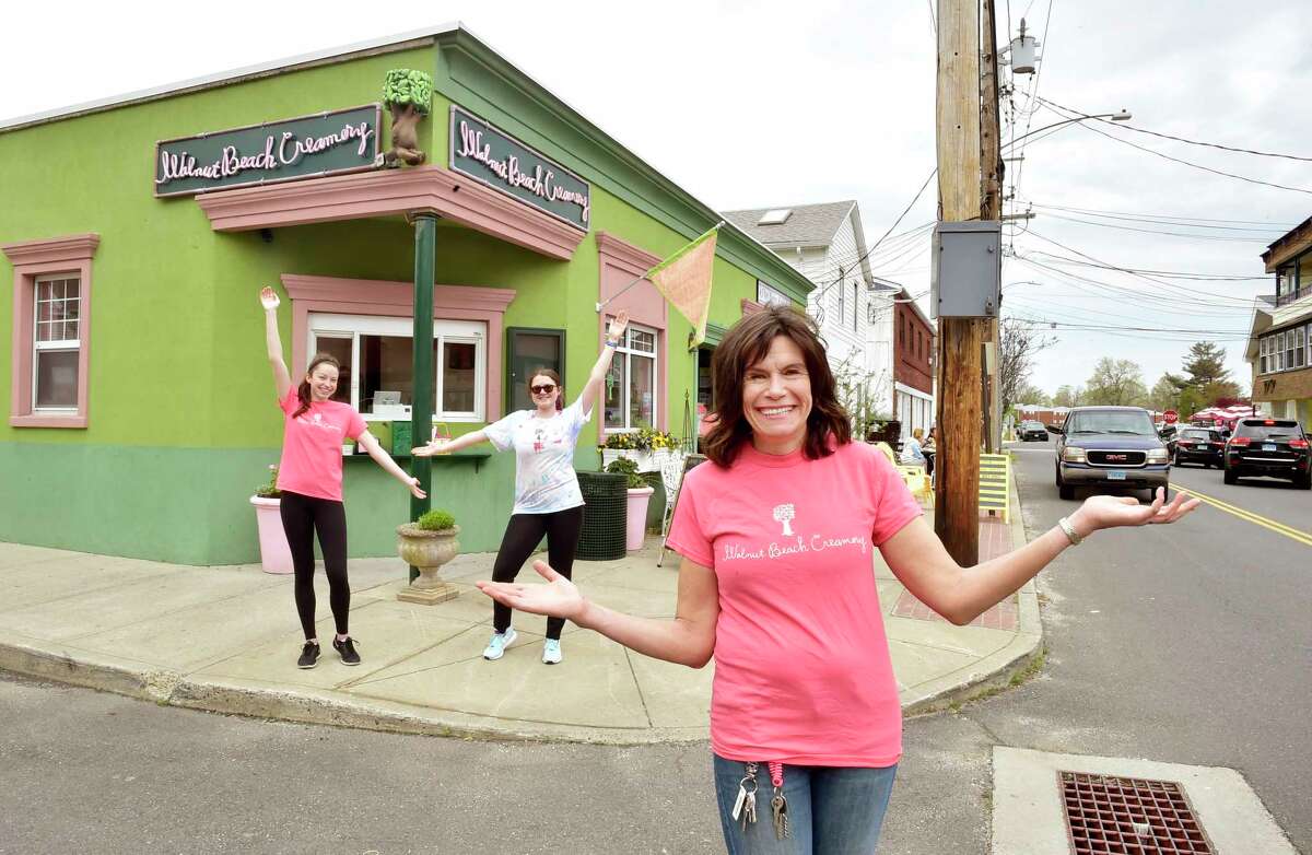 Susan Patrick, owner of the Walnut Beach Creamery in Milford, right, a popular handcrafted ice cream shop, on May 2, 2021.
