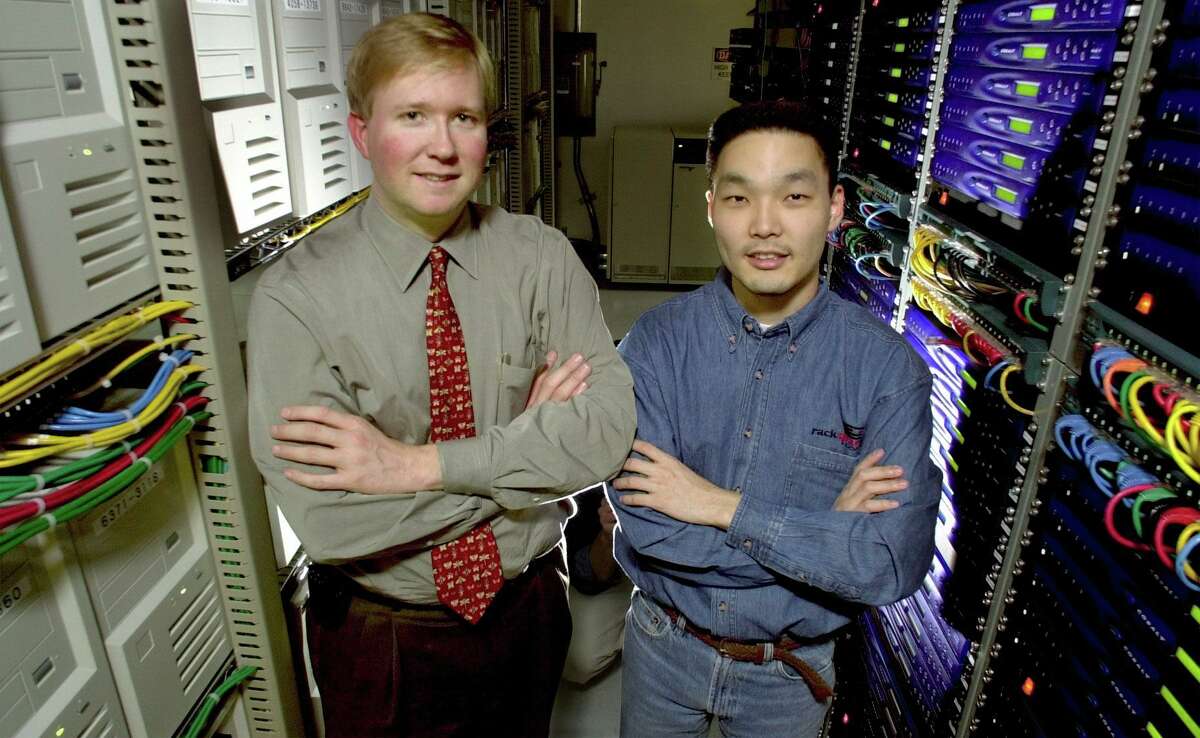 Graham Weston and Richard Yoo with some of the hundreds of servers at their Rackspace offices in early 1999.