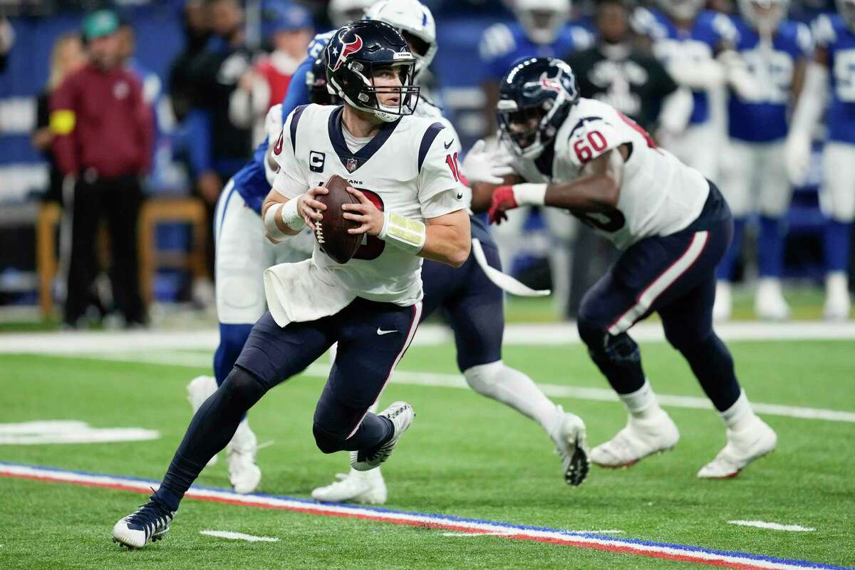 Houston Texans quarterback Davis Mills (10) rolls out to pass against the Indianapolis Colts during the second half of an NFL football game Sunday, Jan. 8, 2023, in Indianapolis.
