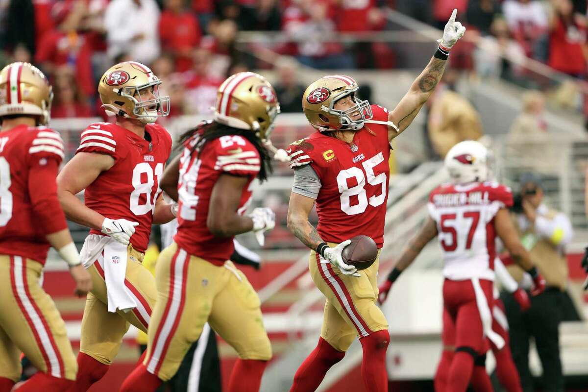 San Francisco 49ers’ George Kittle celebrates his 2nd touchdown catch of the game in 3rd quarter against Arizona Cardinals during NFL game at Levi’s Stadium in Santa Clara, Calif., on Sunday, January 8, 2023.