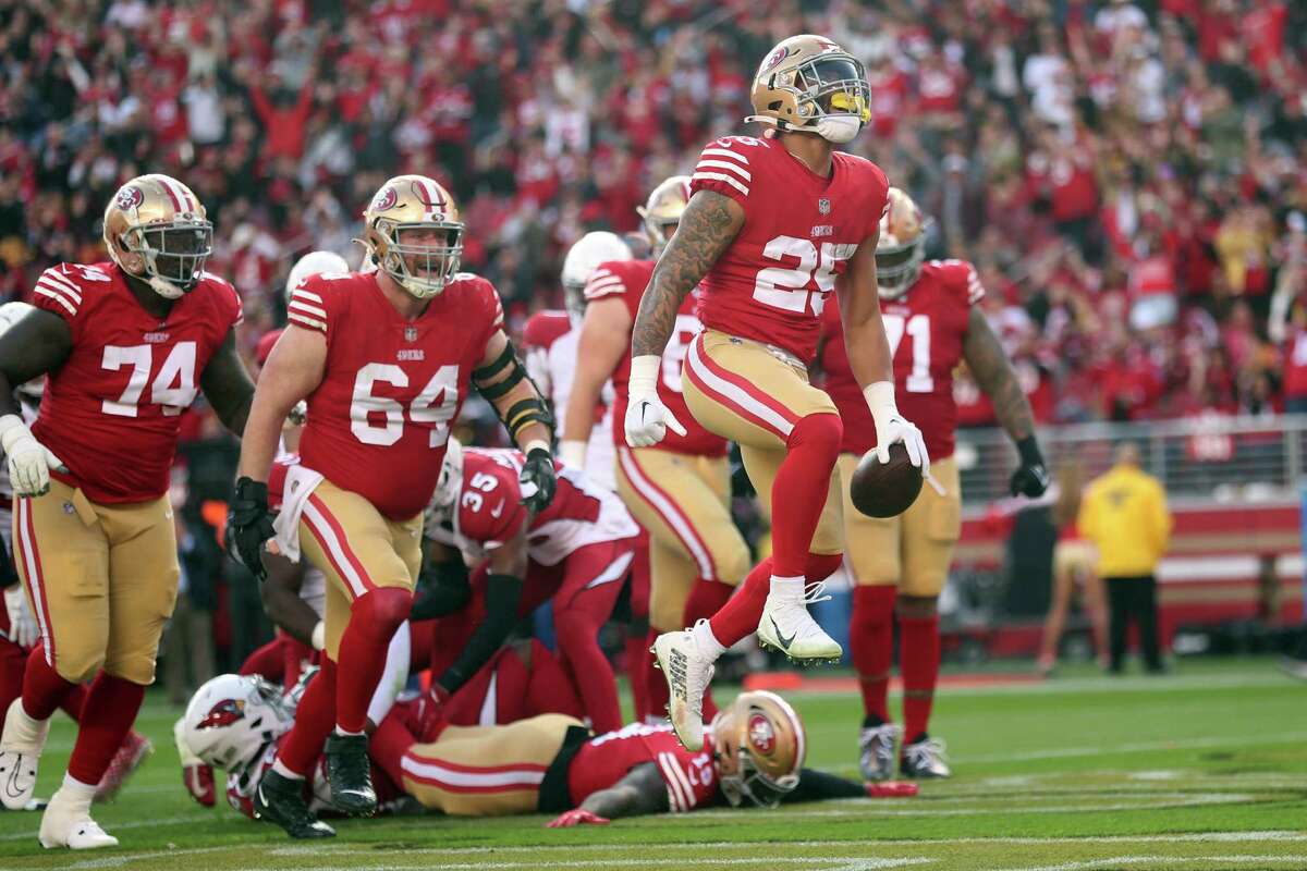 San Francisco 49ers’ Elijah Mitchell celebrates his 2nd quarter touchdown run against Arizona Cardinals during NFL game at Levi’s Stadium in Santa Clara, Calif., on Sunday, January 8, 2023.