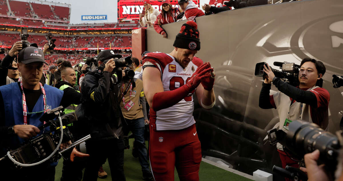 J. J. Watt (99) gestures as he walks off the field for the the last time after the San Francisco 49ers played the Arizona Cardinals at Levi's Stadium in Santa Clara, Calif., on Sunday, January 08, 2023. Watt is retiring from football after this season. The 49ers defeated the Cardinals 38-13, to earn their 10th consecutive win.