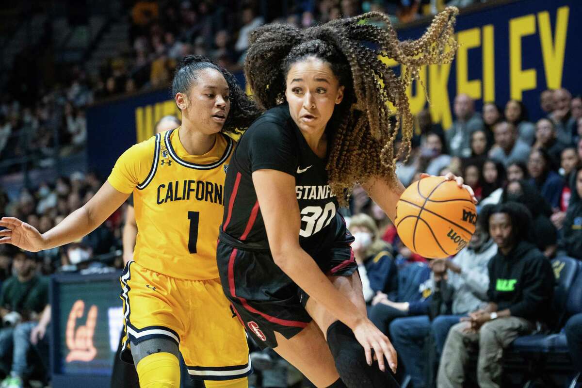 Haley Jones, right, of the visiting Stanford University Cardinal drives against Leilani McIntosh, left, of the California Golden Bears in the second half in Berkeley, California on Sunday, January 8, 2023. The Cardinal finished with a 60-56 victory over the Bears after regulation.