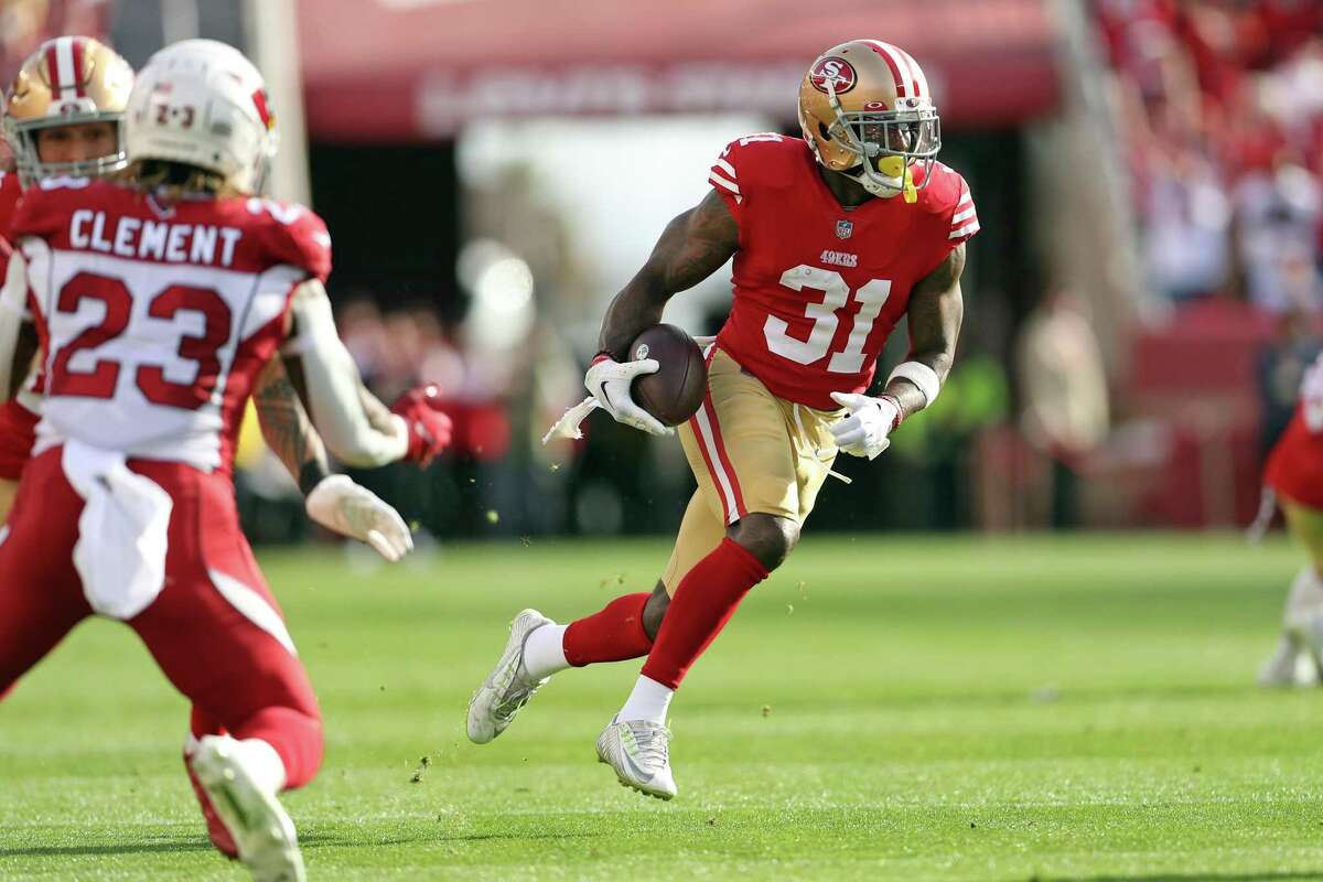 Tashaun Gipson returns an interception in a game against the Arizona Cardinals in  January. He led the 49ers with five interceptions last season.
