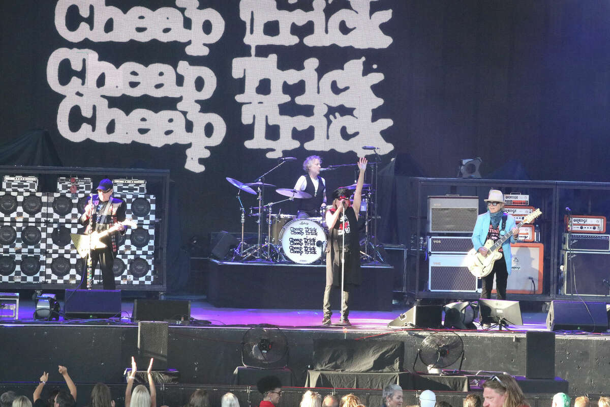 (L-R) Rick Nielsen, Daxx Nielsen, Robin Zander, and Tom Petersson of Cheap Trick perform at Budweiser Stage on July 26, 2022 in Toronto, Ontario.