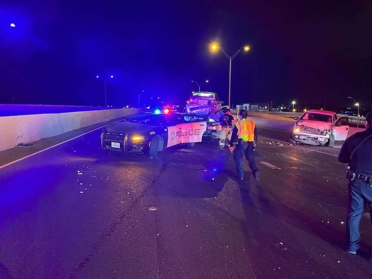 A suspected drunk driver crashed into a Laredo police unit early Monday on Bob Bullock Loop while officers were at the scene of a hit-and-run crash.