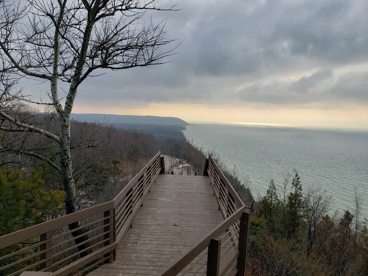 The overlook area in Arcadia shows Lake Michigan's wintry colors contrasting with land where snowfall had melted. 