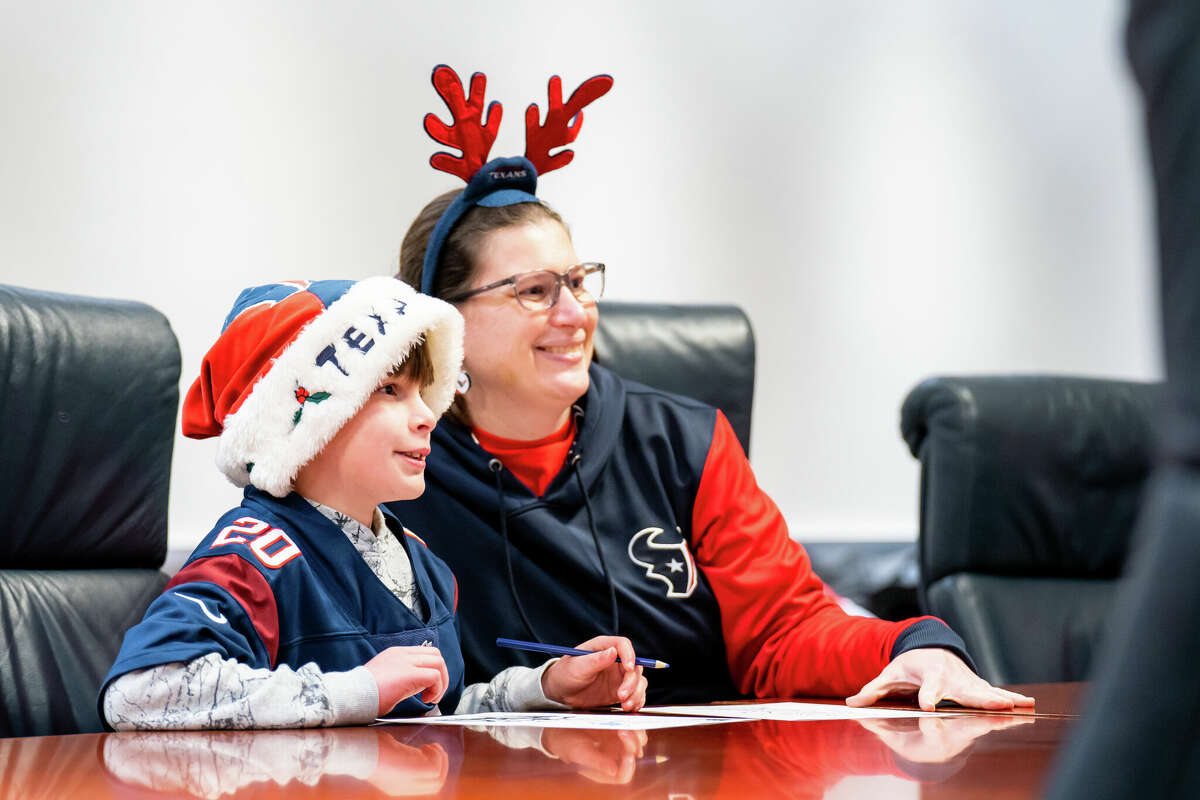 Becky Hunt and her adopted son Brian write a letter to Santa TORO. Hunt found out they had won the trip to NRG Stadium to meet TORO and receive presents for Christmas on Dec. 19, 2022.
