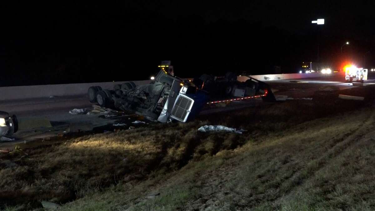 A crash involving several tractor-trailers early Monday injured one driver, spilled 200 gallons of diesel fuel across Interstate 45 in northern Montgomery County and caused traffic delays.