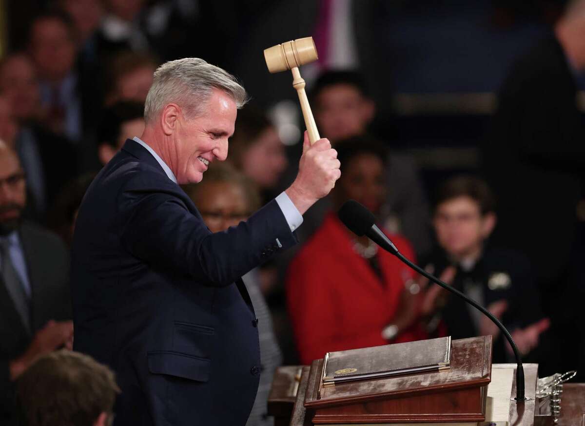 U.S. Speaker of the House Kevin McCarthy bangs the gavel Saturday. At long last, McCarthy is House speaker, but it came at an incredible political cost.